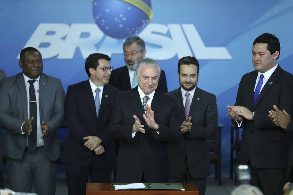 O presidente Michel Temer durante cerimônia de assinatura do decreto que regulamenta a criação de cotas para jovens negros aprendizes, no Palácio do Planalto.