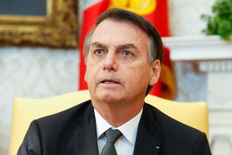 O presidente do Brasil, Jair Bolsonaro, durante reunião com o presidente dos EUA, Donald Trump, no Salão Oval da Casa Branca, em Washington (EUA).