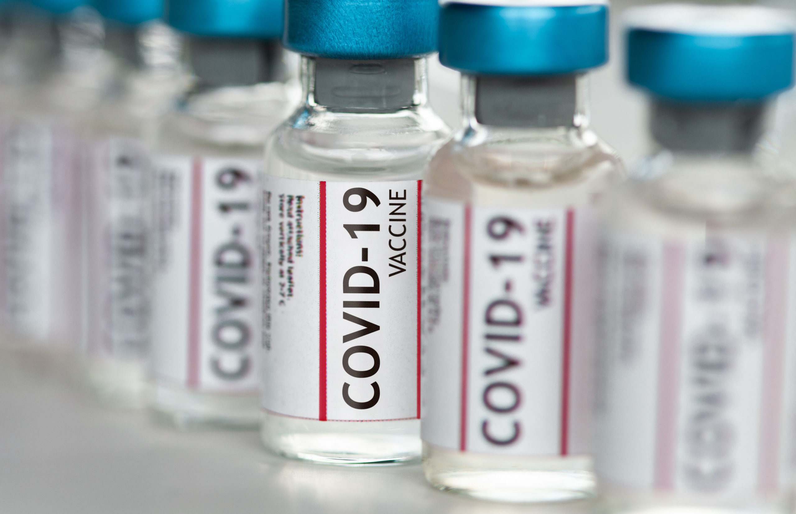 Covid-19 Coronavirus Vaccine vials in a row macro close up